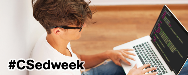 Photo of a student on a laptop with the text "#CSedweek" overlayed in the bottom left corner